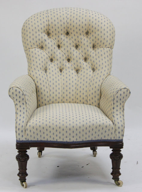 A Victorian upholstered armchair