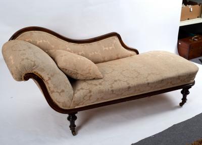 A Victorian upholstered scroll