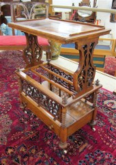 A VICTORIAN WALNUT CANTERBURY