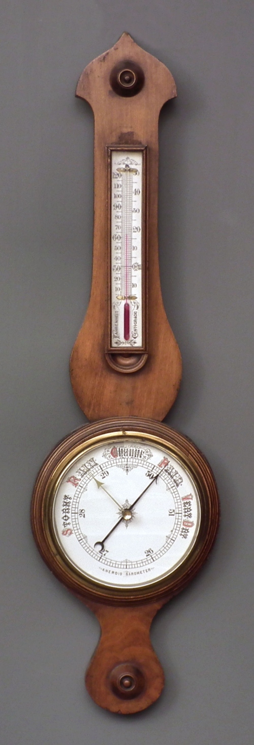 A Victorian walnut cased aneroid