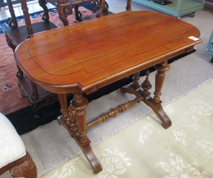 A VICTORIAN WALNUT CENTER TABLE,
