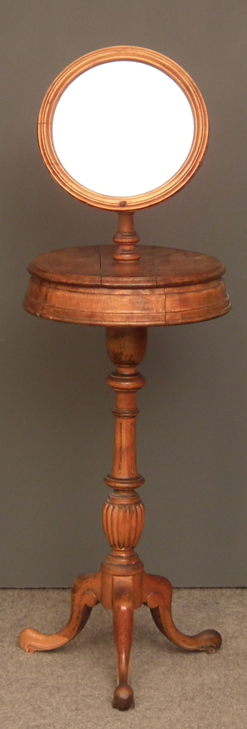 A Victorian walnut circular shaving