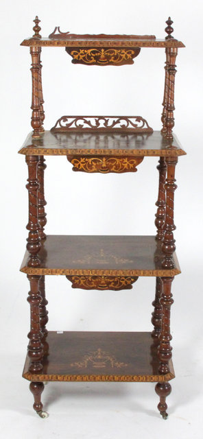 A Victorian walnut four-tier