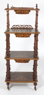 A Victorian walnut four-tier w