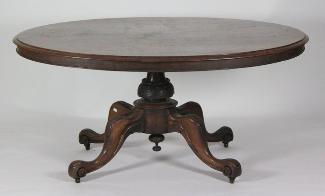 A Victorian walnut loo table the