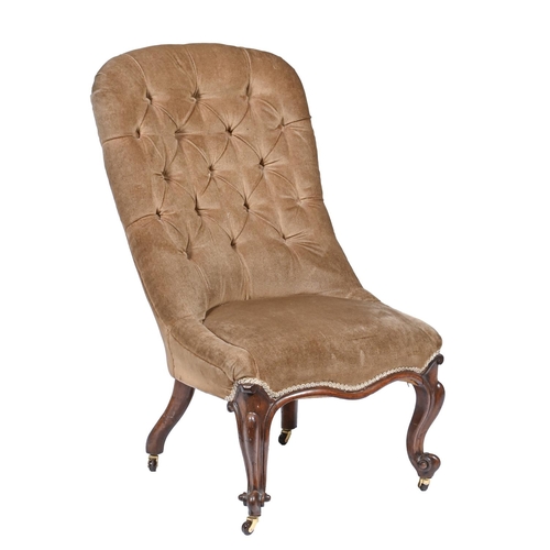 A Victorian walnut nursing chair