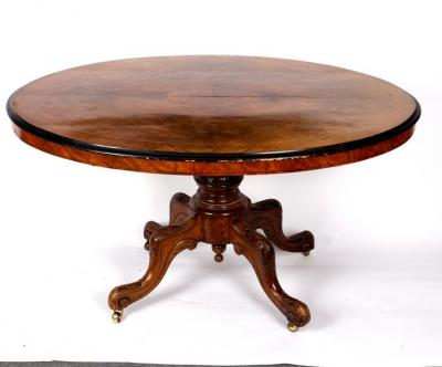 A Victorian walnut oval table