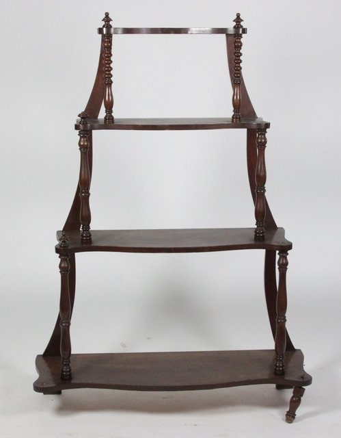 A Victorian walnut serpentine front