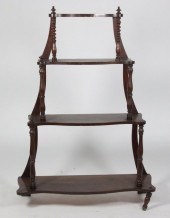 A Victorian walnut serpentine