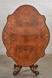 A VICTORIAN WALNUT TILT TOP BR