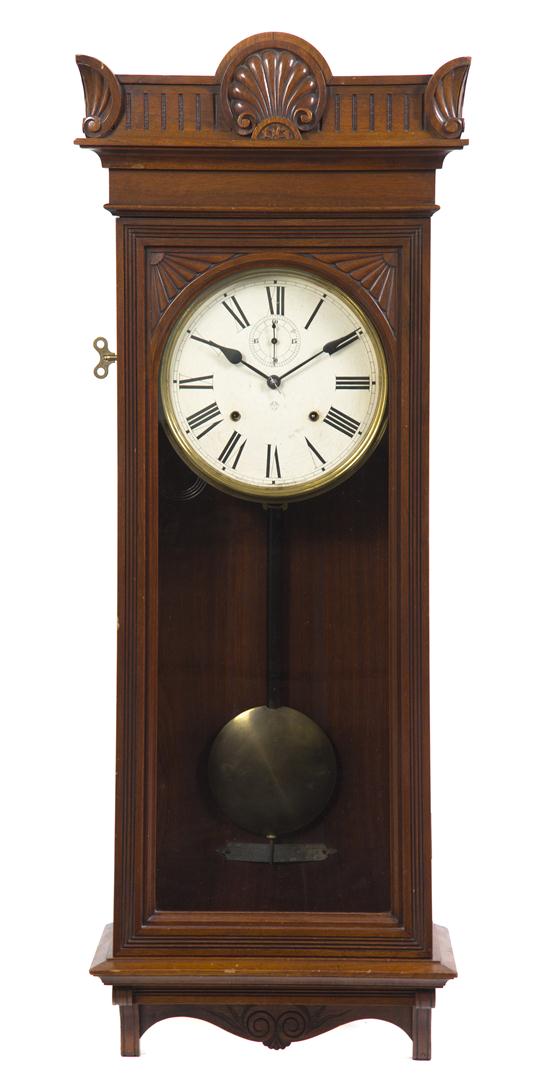A Victorian Walnut Wall Clock