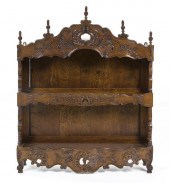 A Victorian Walnut Whatnot She