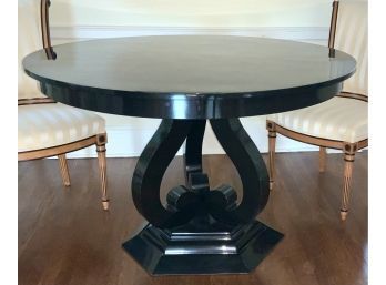 A Vincent Wolfe black lacquer round