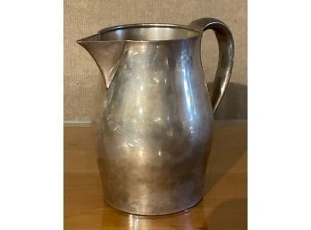 A vintage American sterling water