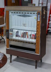 A VINTAGE CANDY VENDING MACHIN