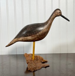 A vintage carved and painted wood