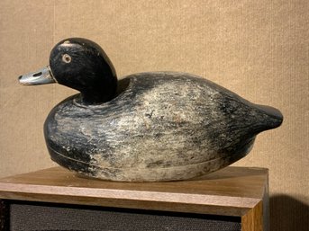 A vintage carved and painted wood