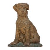A VINTAGE CAST IRON TERRIER DO