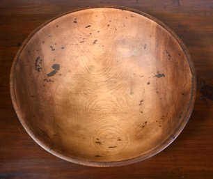 A vintage circular turned maple