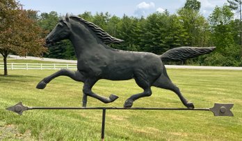 A vintage copper running horse