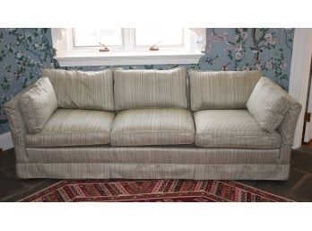 A vintage, custom upholstered three