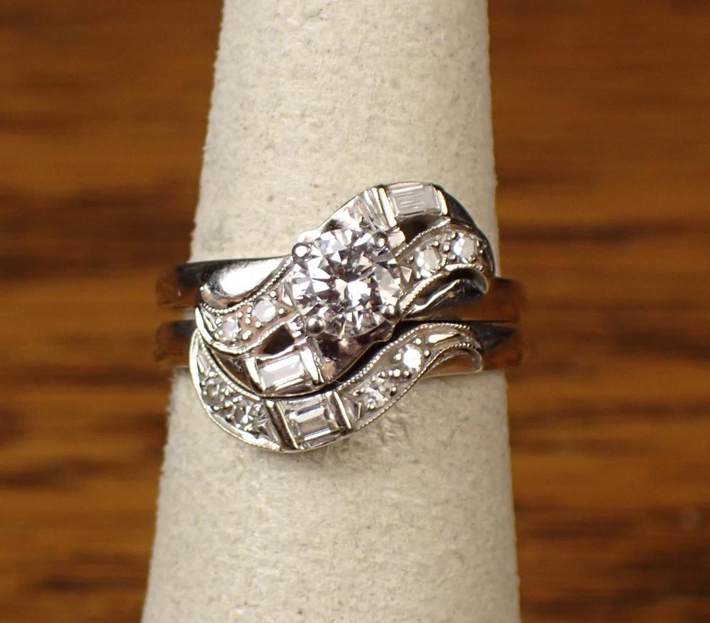 A VINTAGE DIAMOND WEDDING RING SETA
