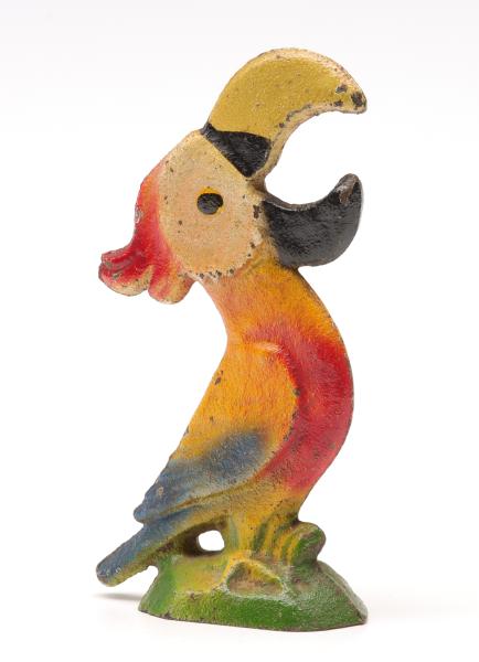 A VINTAGE FIGURAL IRON BOTTLE