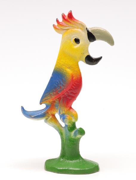 A VINTAGE FIGURAL IRON BOTTLE