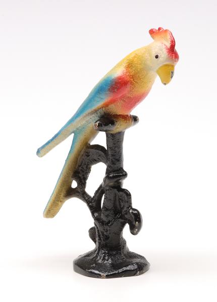 A VINTAGE FIGURAL IRON BOTTLE