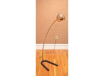 A vintage floor standing arc
