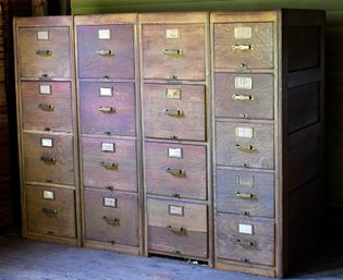 A vintage four-part oak file