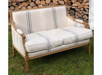 A vintage French settee with a