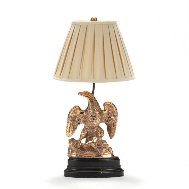 A VINTAGE GILT EAGLE TABLE LAMP