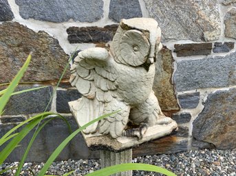 A vintage glazed concrete owl