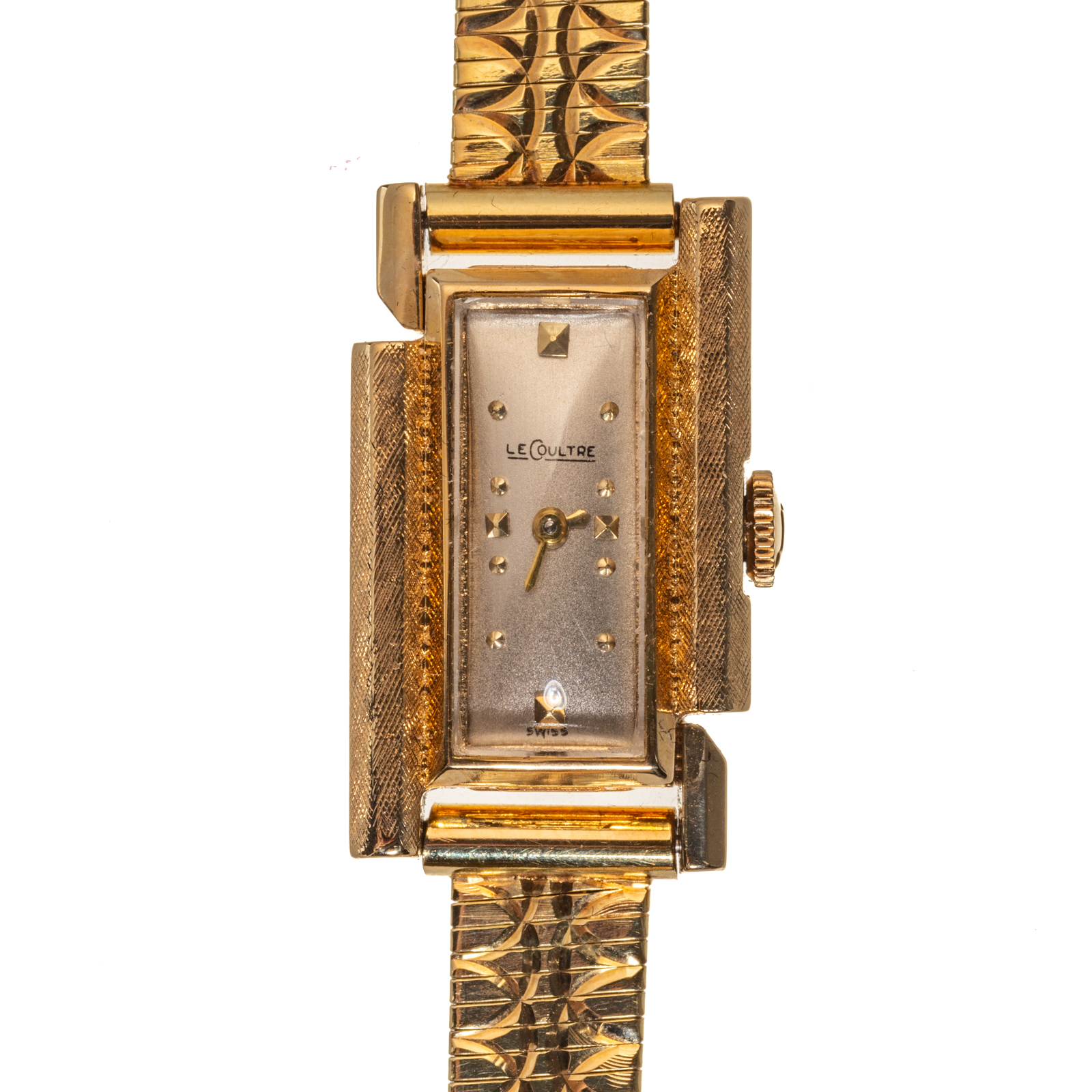 A VINTAGE LE COULTRE WRIST WATCH IN