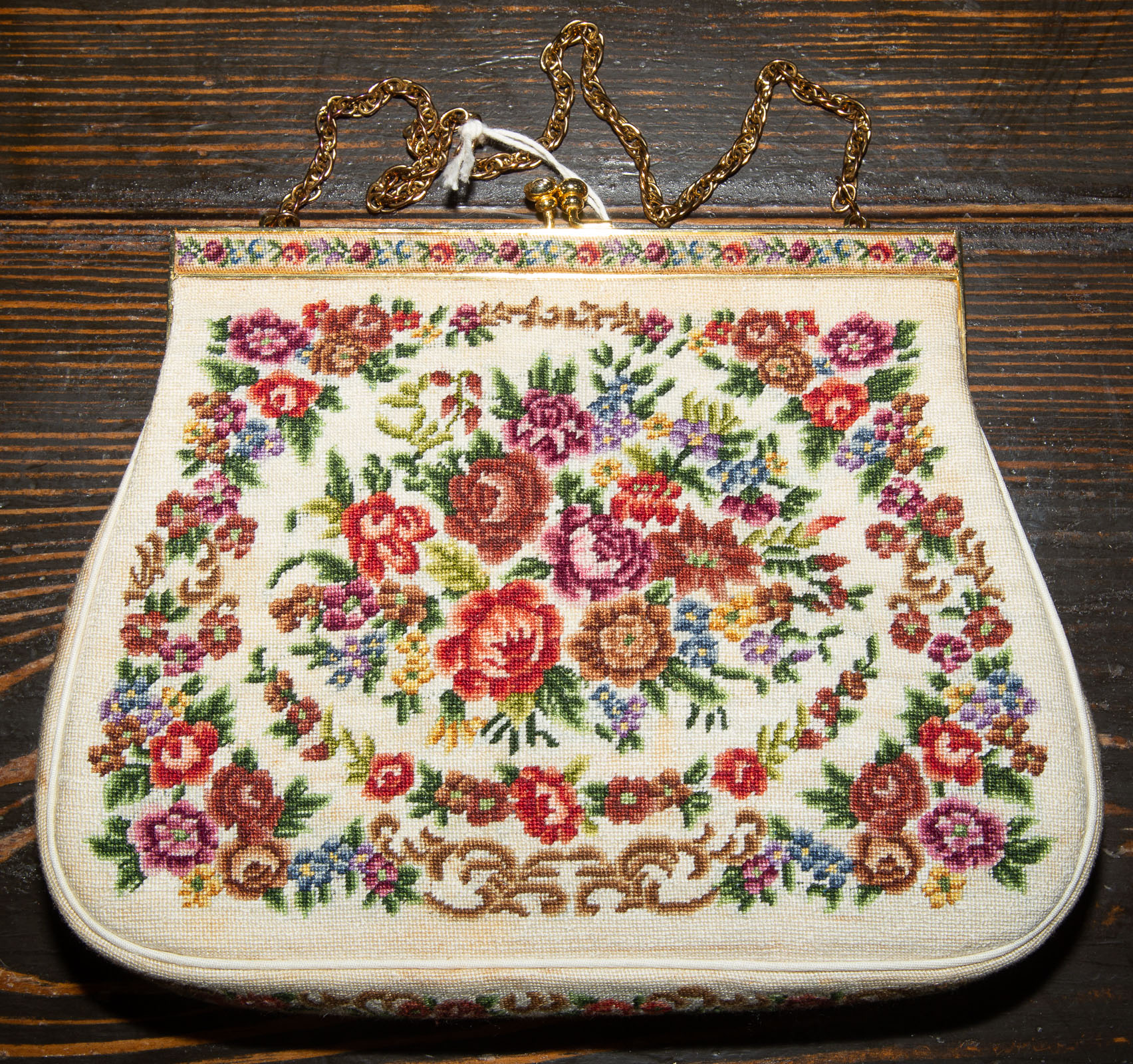 A VINTAGE NEEDLEPOINT BAG A cream