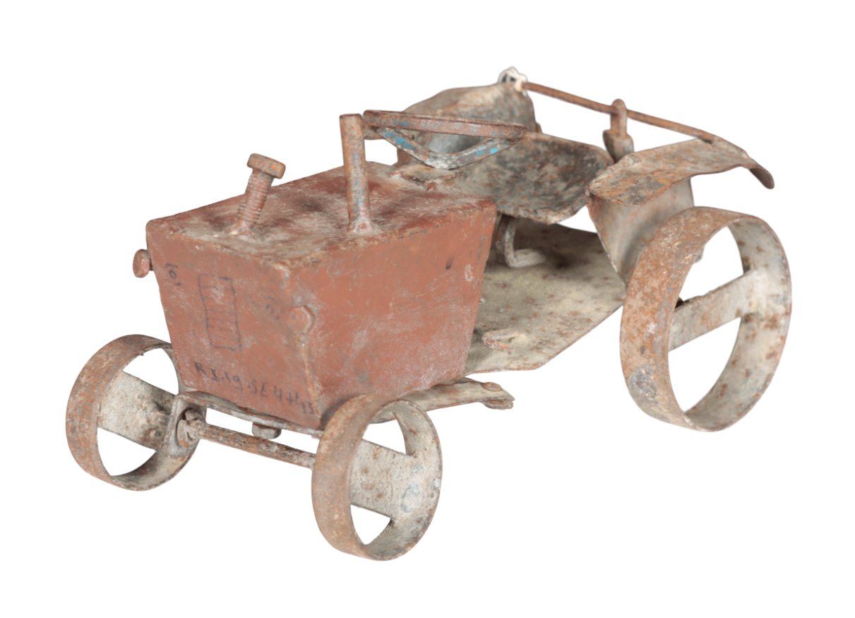 A VINTAGE PAINTED METAL MODEL
