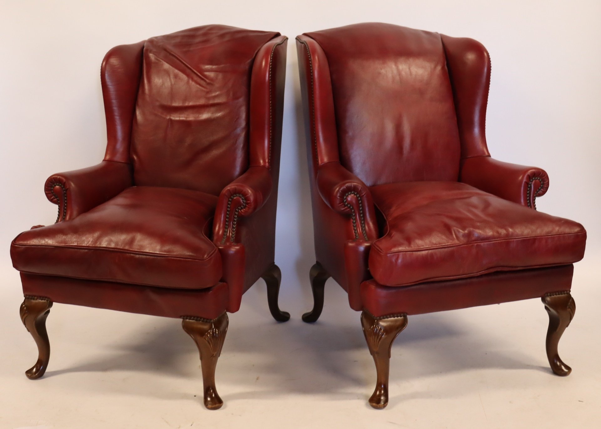 A VINTAGE PAIR OF RED LEATHER