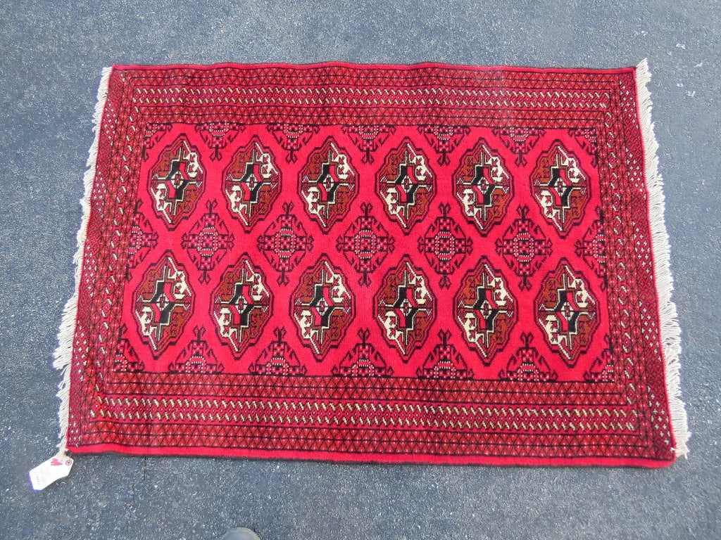 A VINTAGE PERSIAN BOKHARA RUGA