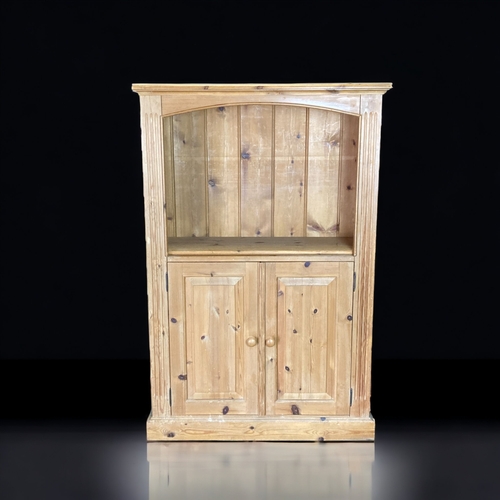 A VINTAGE PINE CABINET.