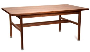 A vintage teak table/desk with a