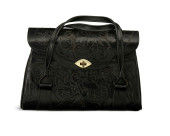 A VINTAGE WESTERN TOOLED BLACK