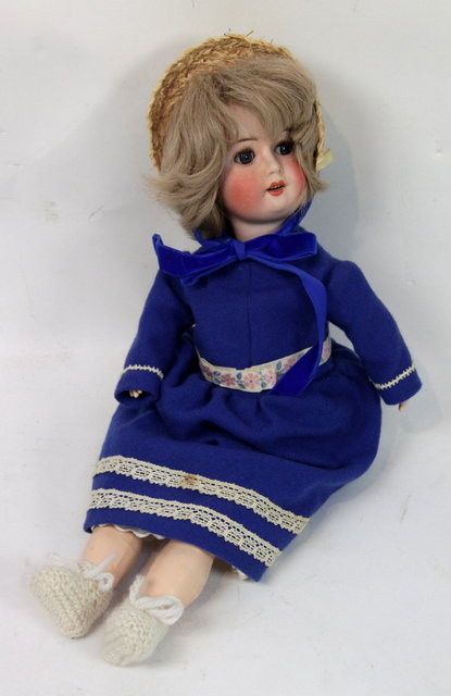 A W G German bisque headed doll