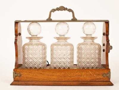 A W Thornhill & Co. oak Tantalus,