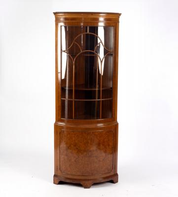 A walnut and burr walnut bowfront