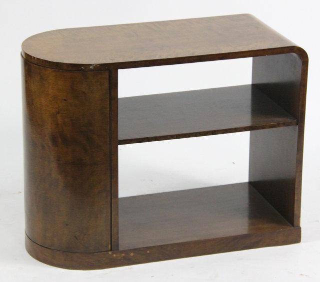 A walnut cabinet with half round