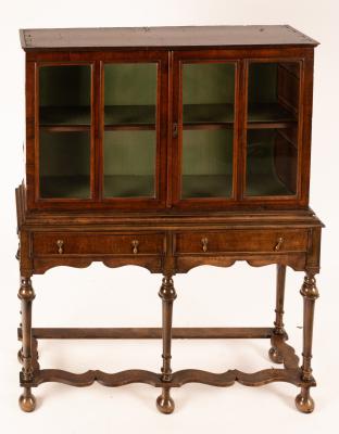 A walnut display cabinet, William
