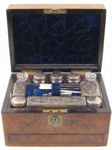 A walnut dressing case with
