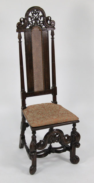 A walnut high back chair of
