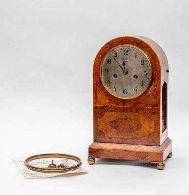 A walnut mantel clock, Louis